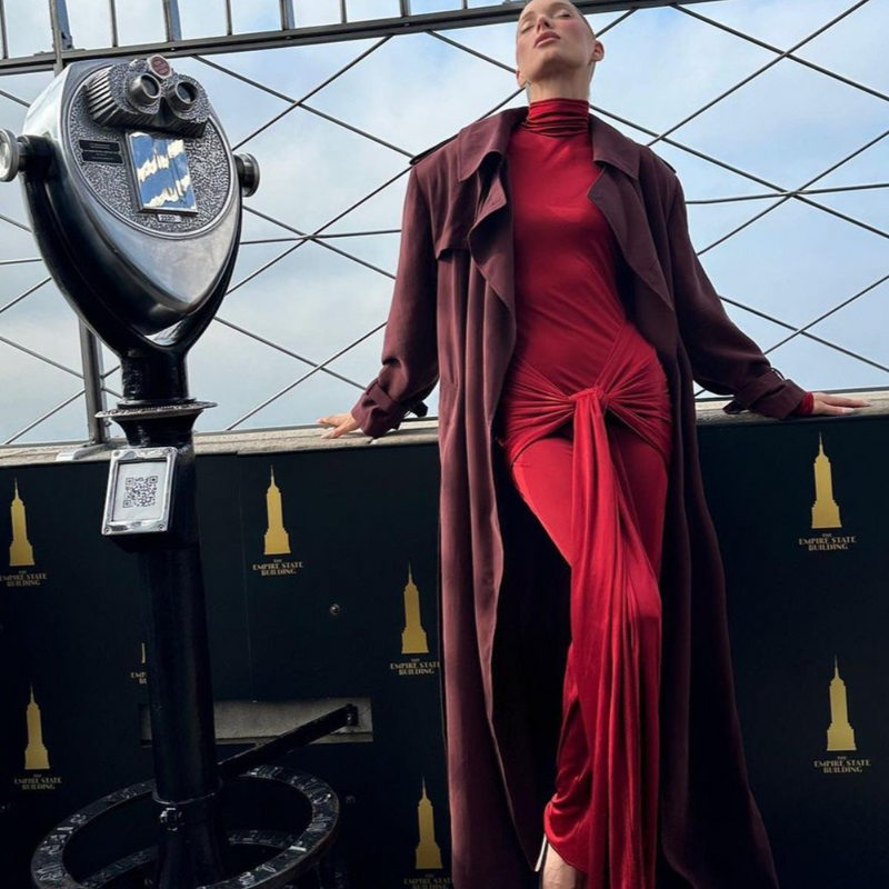 Bold red bodycon dress with long sleeves, high neckline, and gathered waist design – chic cocktail and evening dress.