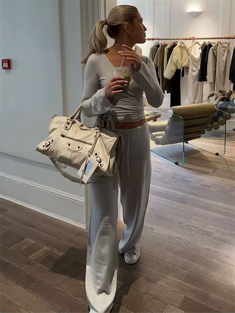 Women’s 2-piece yoga & pilates lounge set – vintage V-neck crop top & high-waisted pants, perfect for workouts, loungewear & casual fashion. Soft, stretchy, and stylish activewear for ultimate comfort.