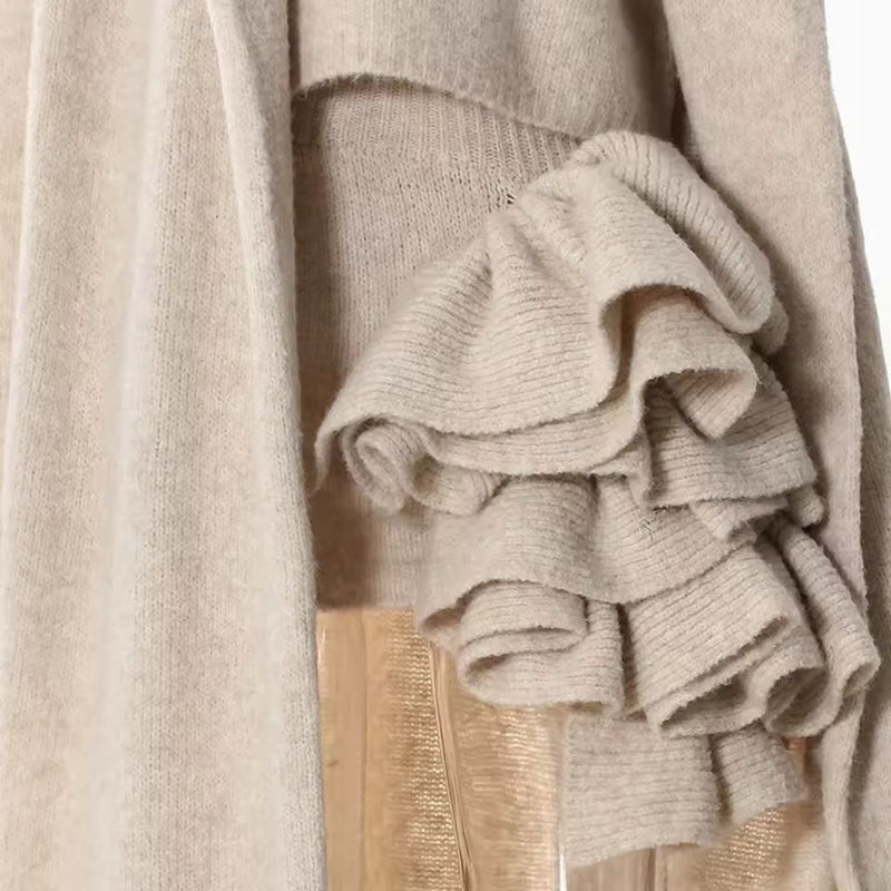 Elegant women’s knitwear set in beige – long wool blend coat, turtleneck sweater and midi skirt with ruffle detail, autumn winter fashion outfit.