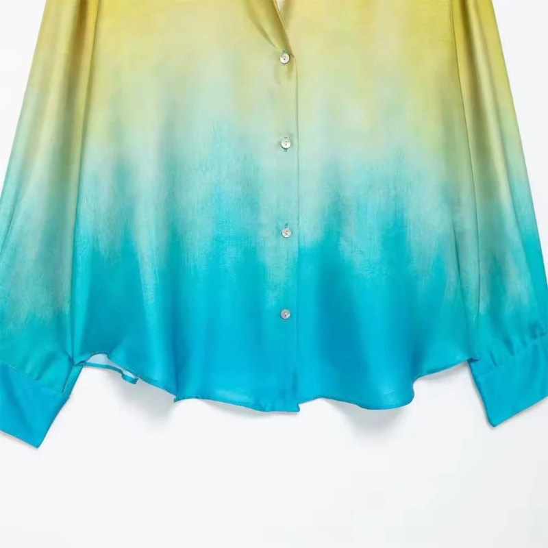 Two-piece ombre outfit with yellow to blue gradient – button-up shirt with collar and high-waisted wide-leg pants in soft polyester.