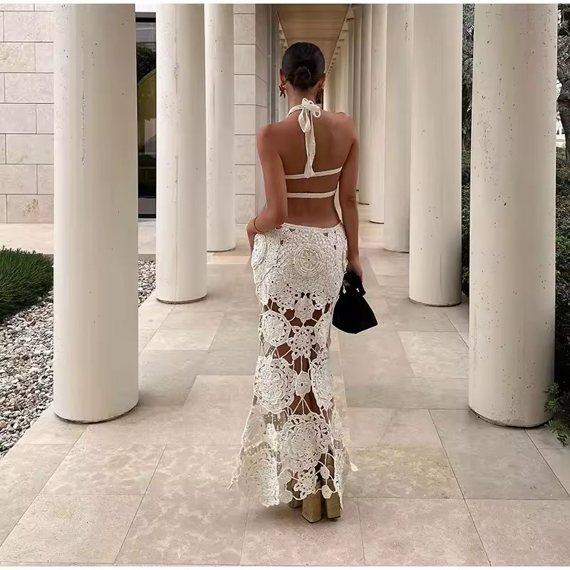 Summer outfit featuring a sheer, backless crochet dress styled for a Mediterranean vibe.