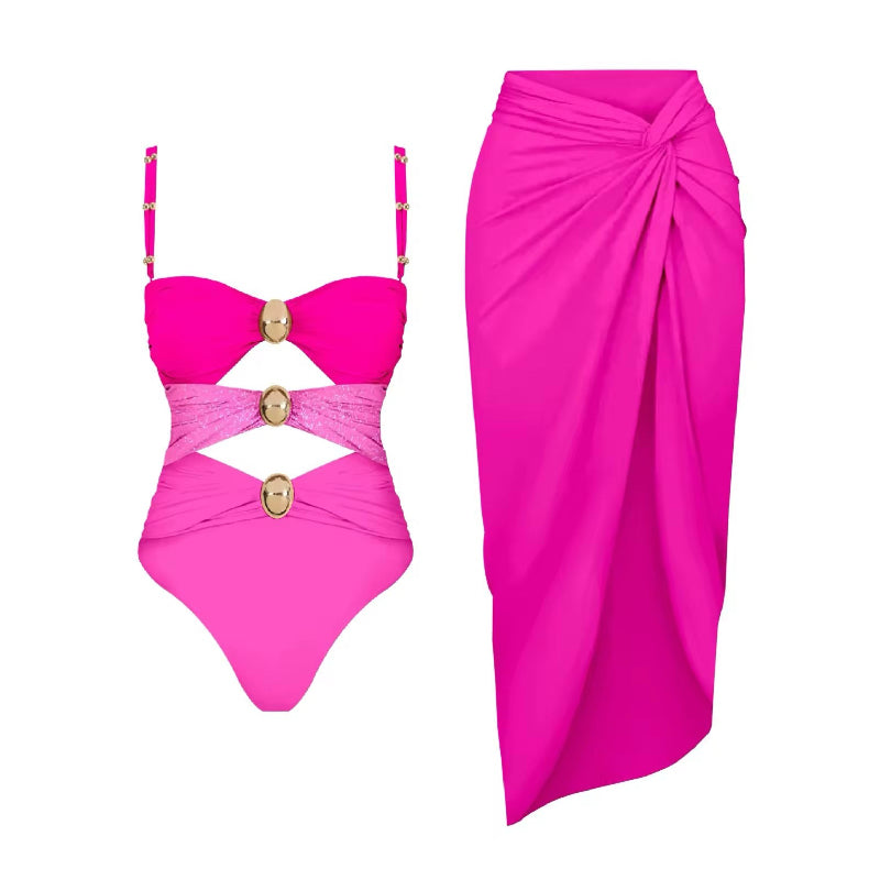 Luxury cut-out one piece swimsuit in bold pink with gold ring details and matching wrap skirt – Chic & Charm beachwear, seamless, wire-free, flattering fit for summer vacation or resort look.