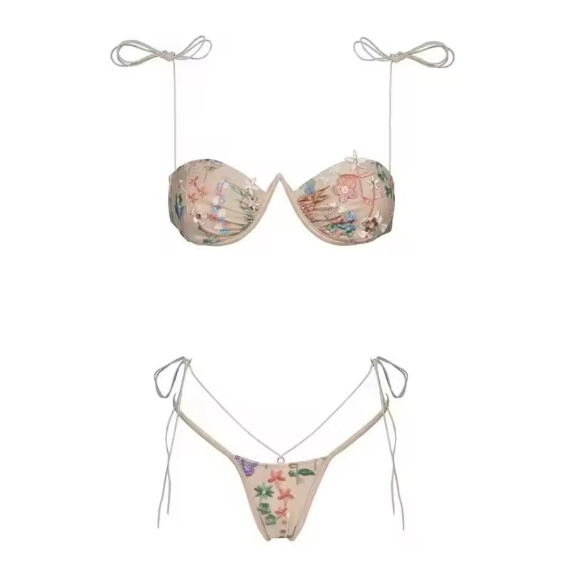 Floral embroidered push-up bikini set with underwire support and micro tie-side bottoms.