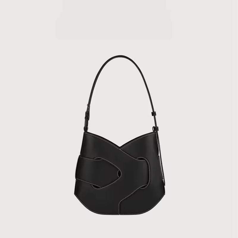 Luxury women’s leather handbag with adjustable strap – Axis crossbody bag in black and taupe
