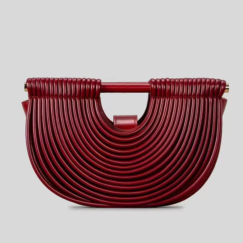 Ventaglio d’Oro clutch with detachable strap – gold metallic evening purse with solid fan silhouette and luxury detailing.