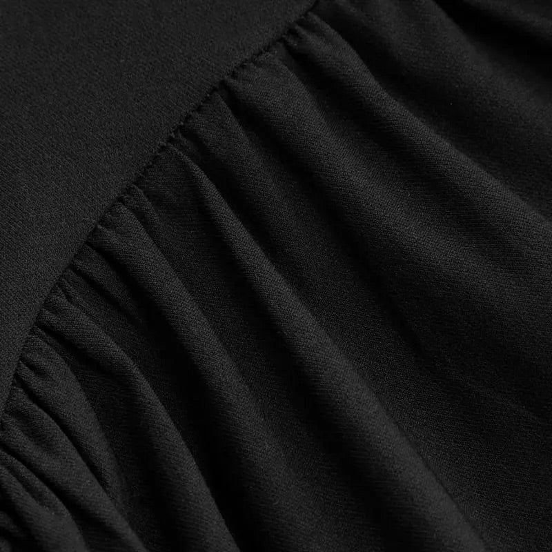 Simple neckholder dress with a chic back cutout, made from stretchy, soft jersey fabric. The dress offers a regular fit for all body types and is perfect for summer, parties, casual outings, and special occasions. Easy-care and durable, it maintains its shape after multiple washes.