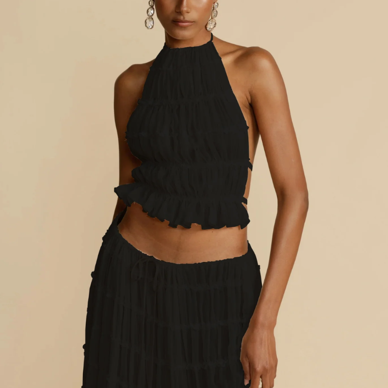 Boho-chic Ibiza dress – 2-piece summer outfit with a flowy pleated maxi skirt and backless halter top, perfect for beach vacations, weddings & festivals.