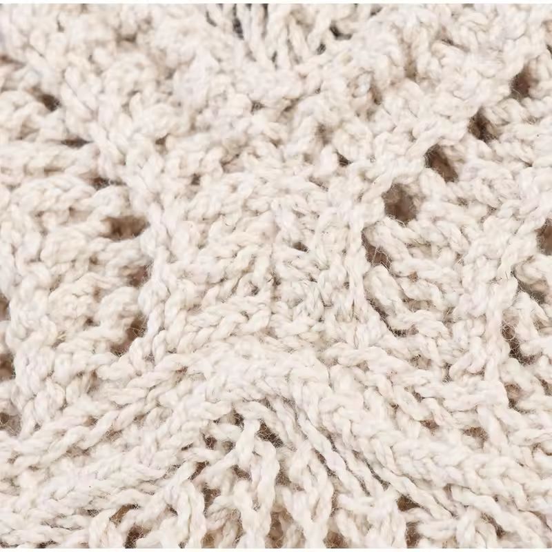 Detailed view of crochet halter neck top with open knit texture – lightweight and breathable summer fashion.