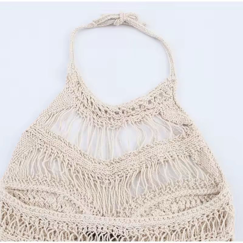 Detailed view of crochet halter neck top with open knit texture – lightweight and breathable summer fashion.