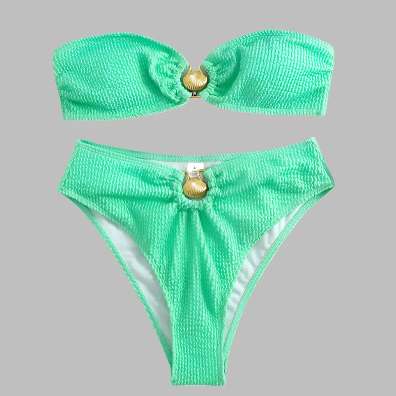 Luxury bikini in mint with gold shell clasp, bandeau cut, and ribbed fabric.
