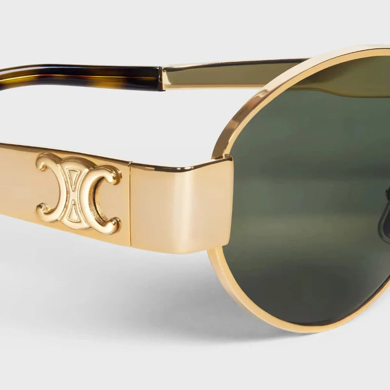 Trendy gold metal frame sunglasses – Ceylie Arc designer oval shades for summer streetstyle 2025