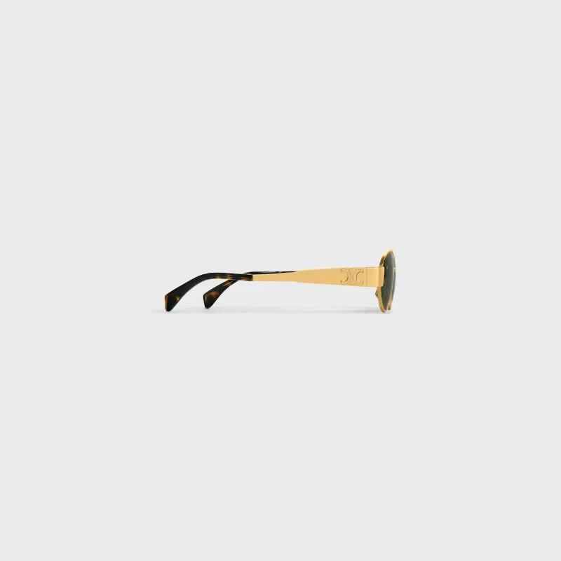 Elegant gold statement sunglasses with green lenses – 925-inspired eyewear trend for summer fashion