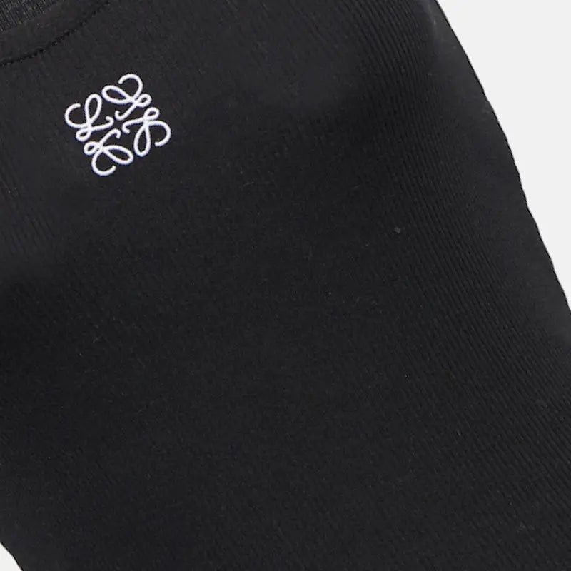 Classic Cotton Sleeveless Top for Women – Soft, breathable, lightweight tank top with round neckline. Available in white, black & gray. Perfect for layering, casual wear & summer outfits. Made in Dubai.