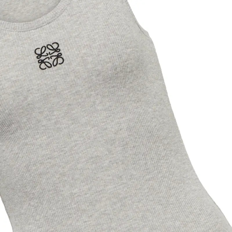 Classic Cotton Sleeveless Top for Women – Soft, breathable, lightweight tank top with round neckline. Available in white, black & gray. Perfect for layering, casual wear & summer outfits. Made in Dubai.