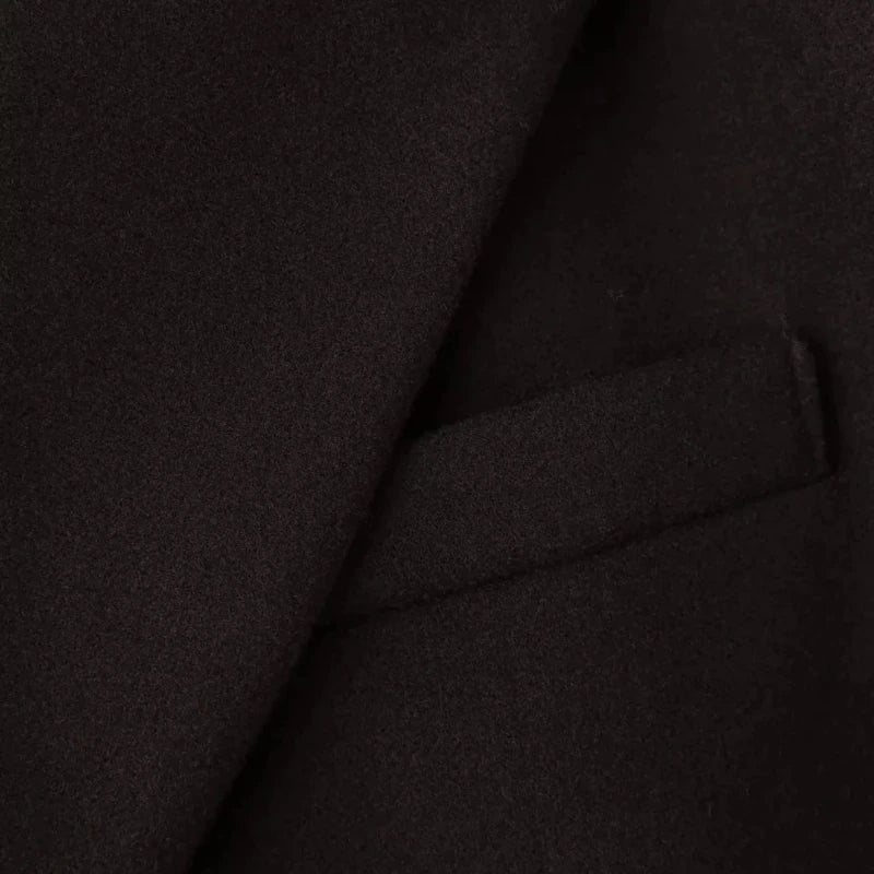 Close-up of Cléa Coat – fringe hem detail on women’s trenchcoat, Chic & Charm fashion