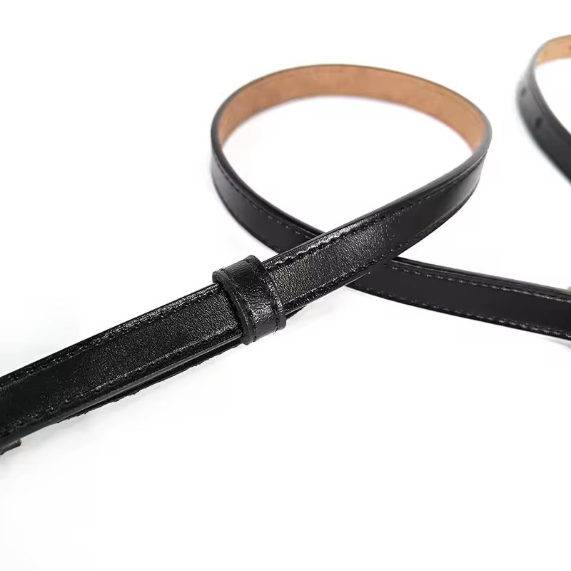 Designer slim leather belt, black strap with elegant gold buckle, premium unisex accessory