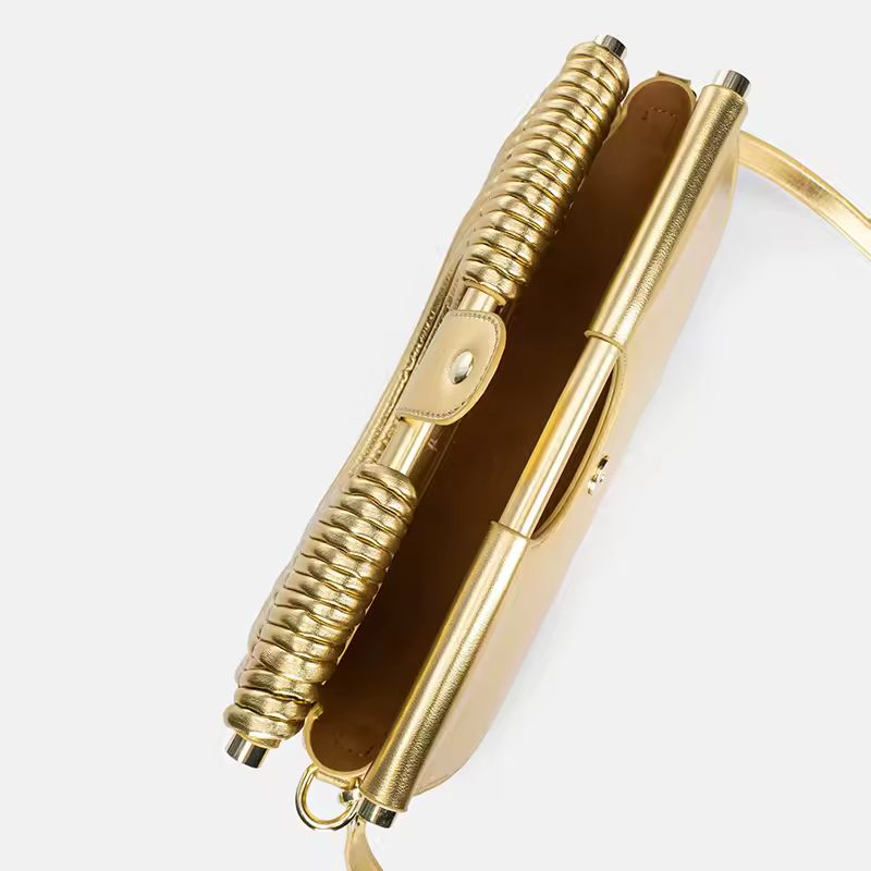 Luxury gold fan-shaped clutch bag Ventaglio d’Oro – structured metallic designer handbag with sculptural design.