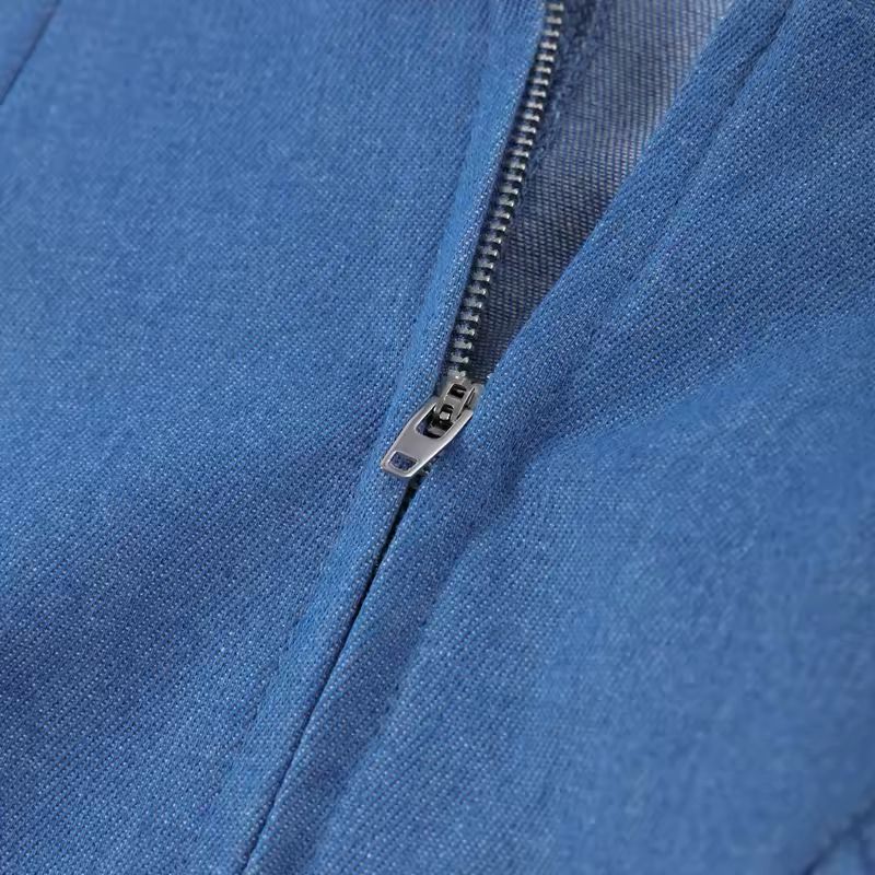 Light blue pleated midi dress flowing in motion – breathable fabric for warm weather