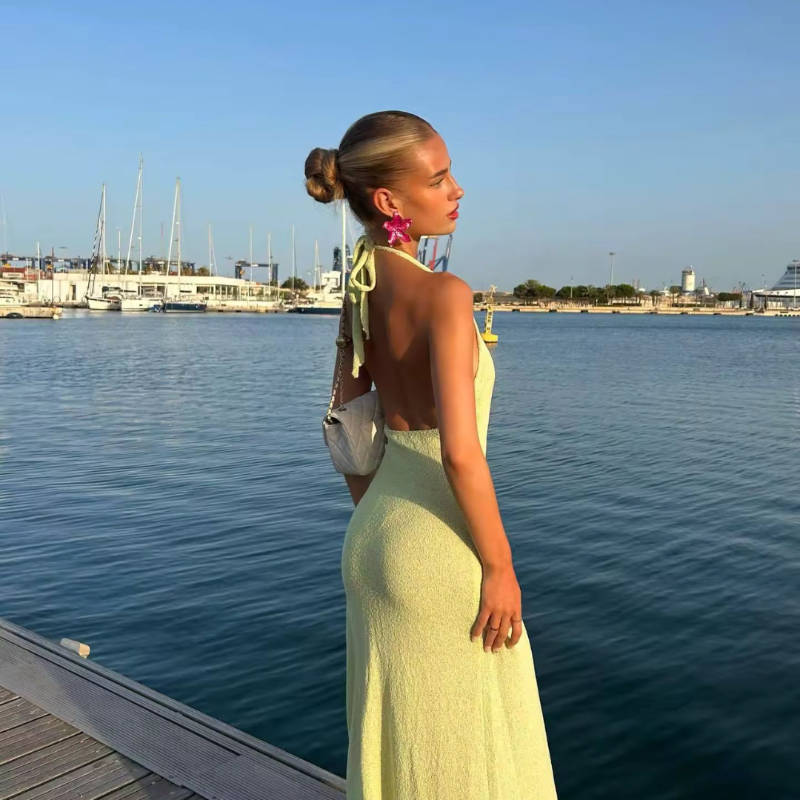 FLEURIA Dress – floral halter maxi for summer 2025. Soft, elegant & limited. Shop now in mint or cream.