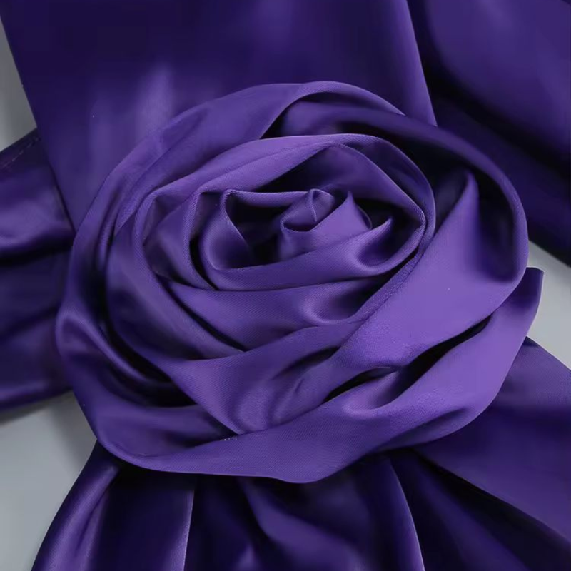 Purple satin evening gown with floral shoulder detail, sleeveless and floor-length – Glamour Mia
