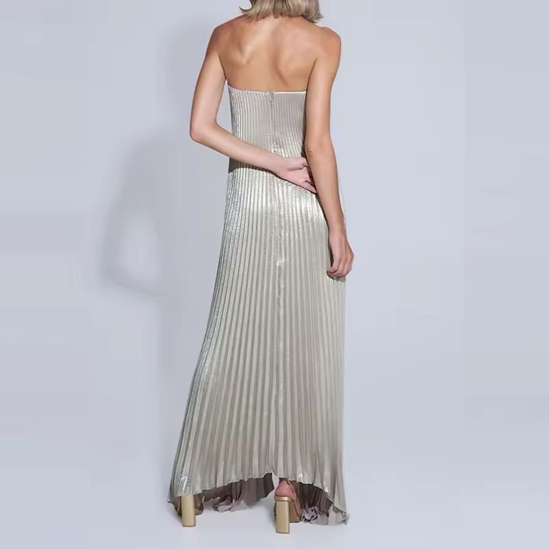 Elegant strapless pleated maxi dress in champagne gold – flowy evening gown for weddings, galas, and parties.