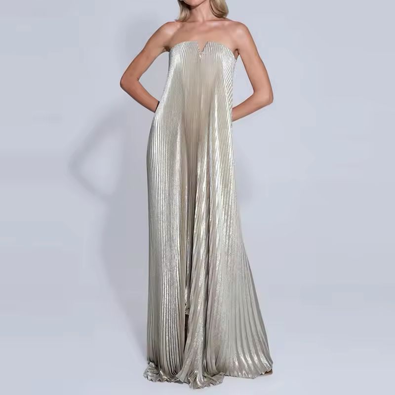 Back of strapless pleated formal dress with zip closure – metallic gold fabric, long and flattering cut.”
