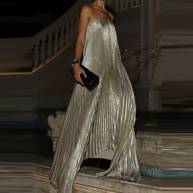 Elegant strapless pleated maxi dress in champagne gold – flowy evening gown for weddings, galas, and parties.