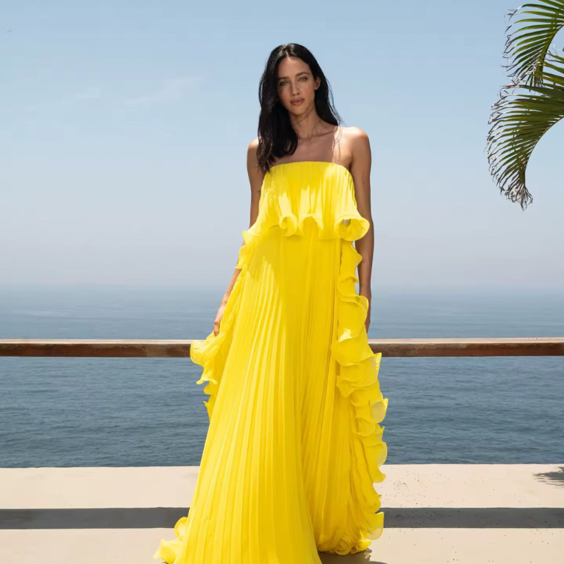 Flowy pleated maxi dress with trumpet silhouette and ruffles – beachwear for women summer 2025