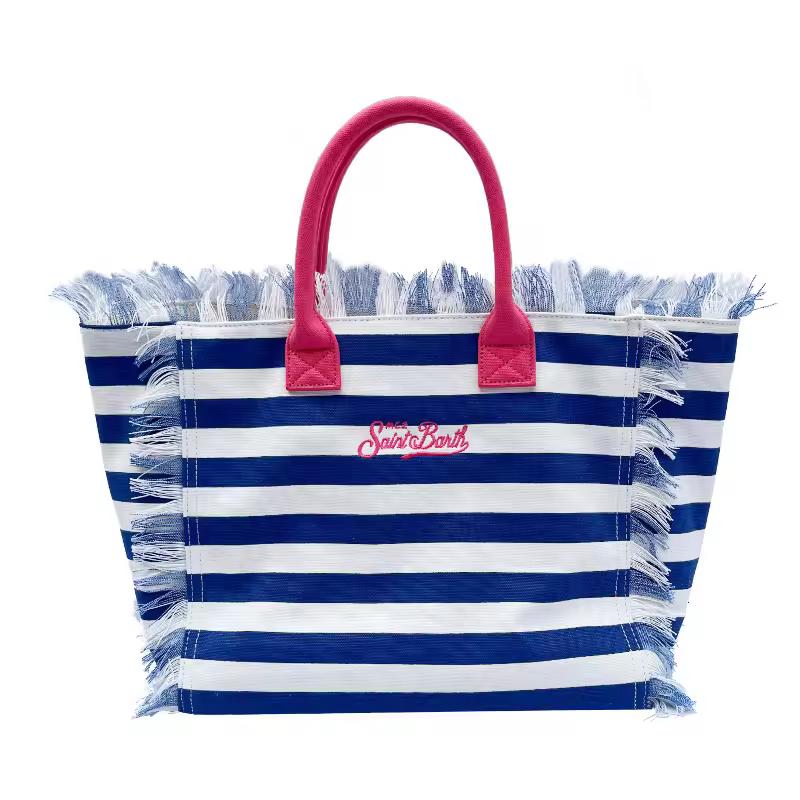 Extra-large Saint Barth canvas beach bag for women with boho fringe and summer script, oversized and handcrafted look.