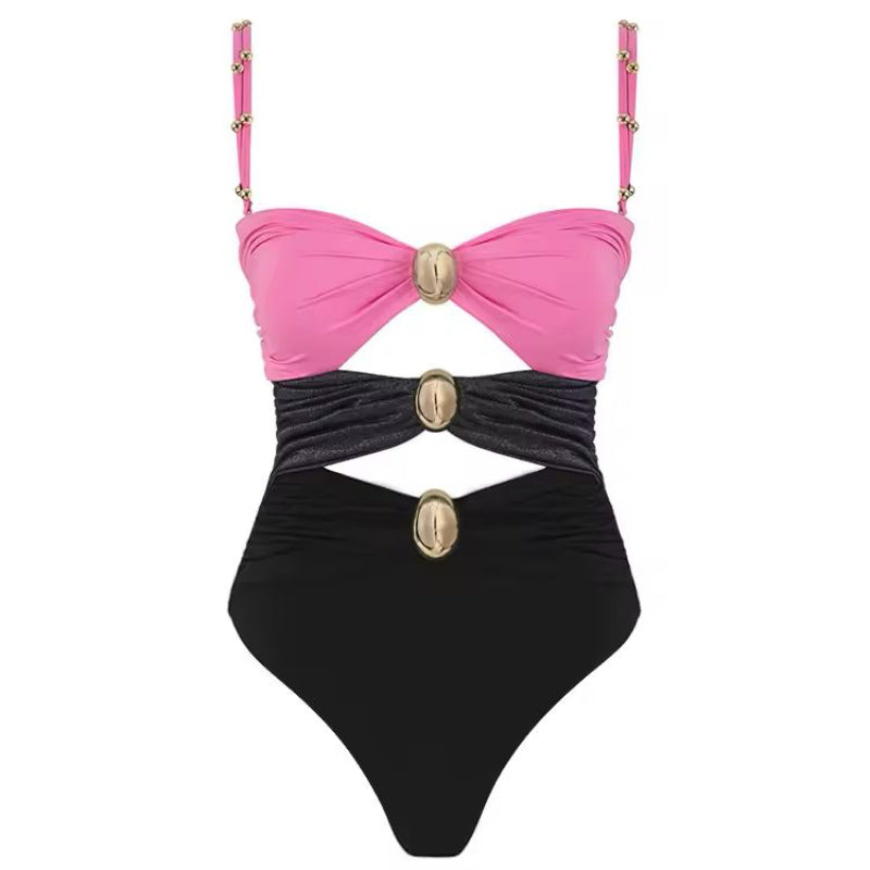 Luxury cut-out one piece swimsuit in bold pink with gold ring details and matching wrap skirt – Chic & Charm beachwear, seamless, wire-free, flattering fit for summer vacation or resort look.