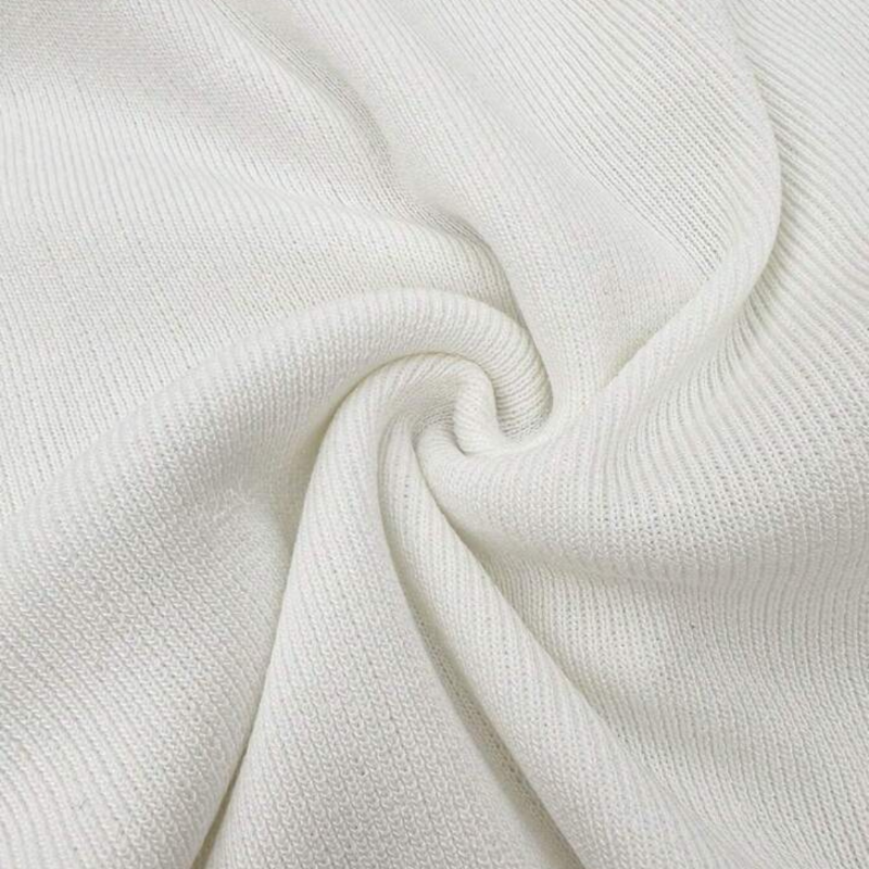 Luxury knitted V-neck top for women – Elegant button-up sweater with a straight-cut silhouette, made from premium cotton blend (80% cotton, 20% polyester). Stylish, breathable, and perfect for casual chic, office wear, and layering. Available in two trendy colors.