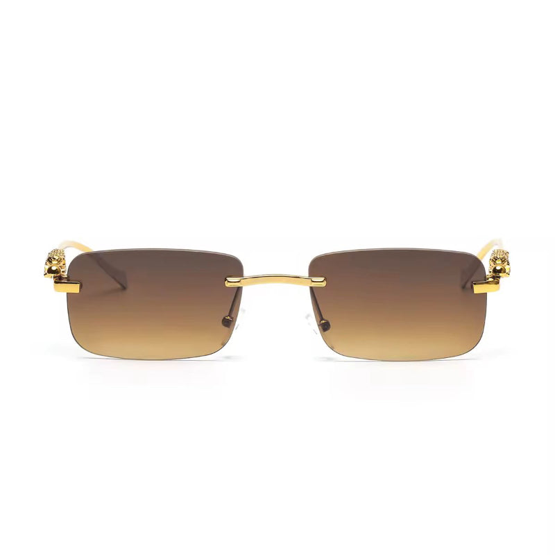 Brown UV400 sunglasses with rimless frame and golden big cat design on the temples