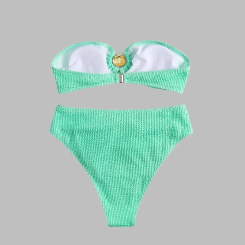 Luxury bikini in mint with gold shell clasp, bandeau cut, and ribbed fabric.
