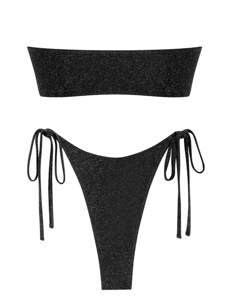 Minimalist black bandeau bikini set with gold O-ring detail and high-leg side-tie bottoms, perfect for luxury summer swimwear looks.