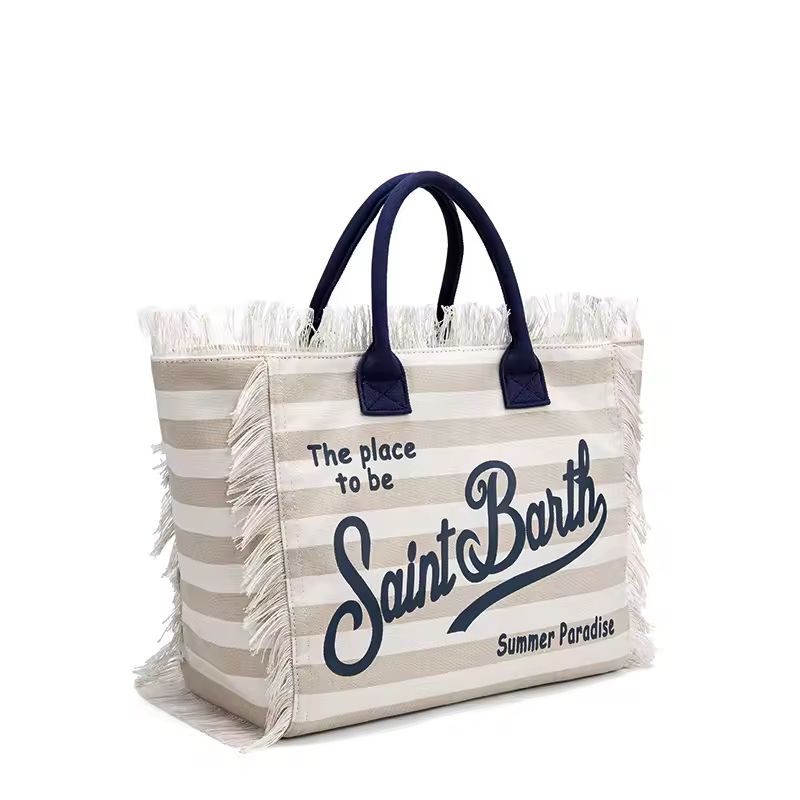 Saint Barth beach bags in hot pink, leopard print, ivory and natural straw – colorful canvas totes with boho vibe for summer 2025.