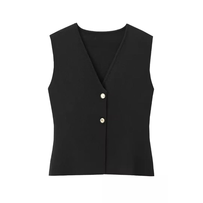 Paris City Muse black elegant two-piece outfit – sleeveless vest with gold accents and long pleated maxi skirt – perfect for evening events and city strolls.