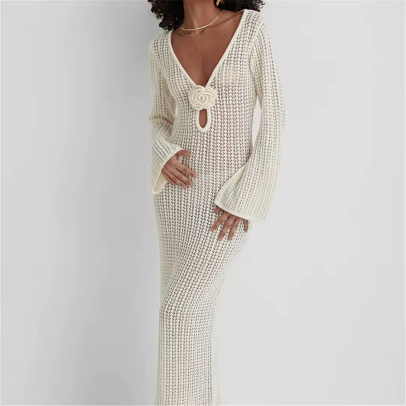 Elegant white crochet dress with long sleeves and floral detail – perfect for beach weddings or summer nights