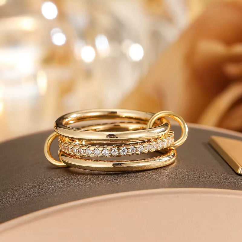 Statement cocktail ring with gold and silver interlocked bands – luxury dual-tone ring for gifting and layering
