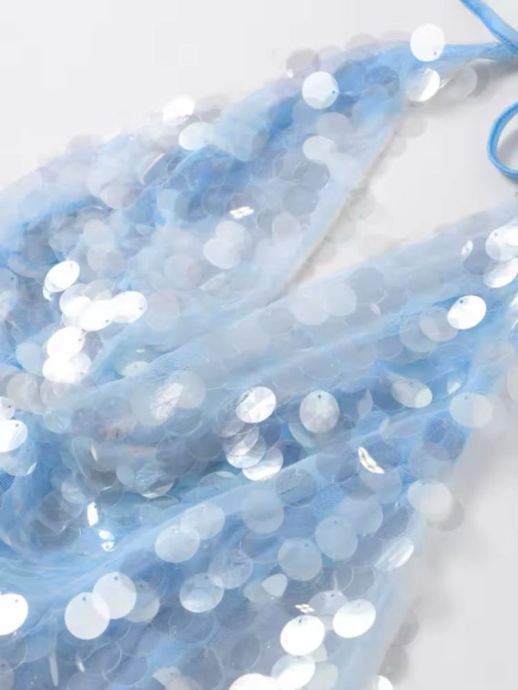 Shimmering sequin and linen-polyester fabric blend in light blue, airy and luxurious texture.