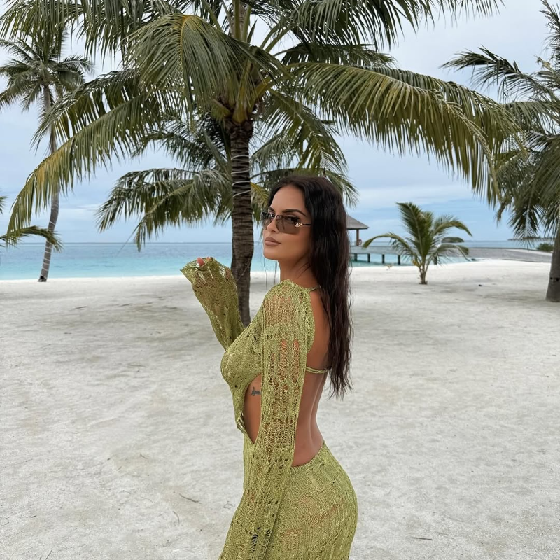 Elegant sheer knit maxi dress with open pattern and shimmer – perfect for trendy beach and holiday looks