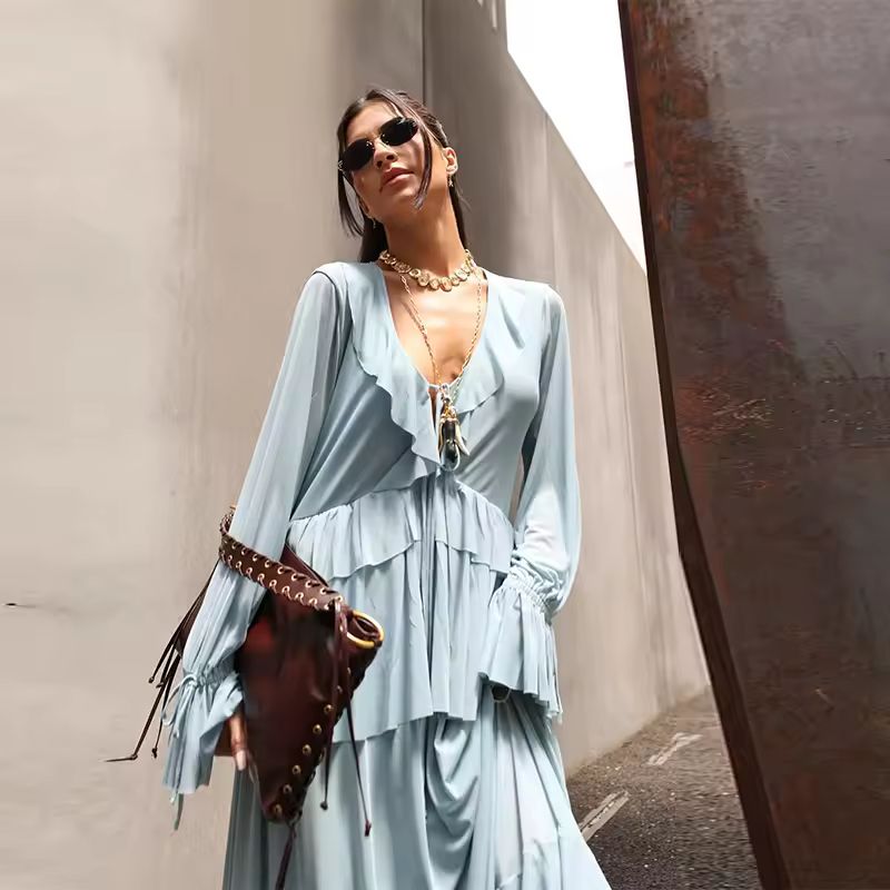 Breezy ankle-length dress in pastel blue with romantic ruffles and soft polyester fabric – casual yet chic
