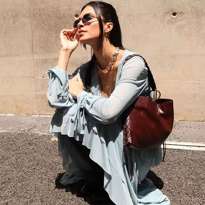Breezy ankle-length dress in pastel blue with romantic ruffles and soft polyester fabric – casual yet chic