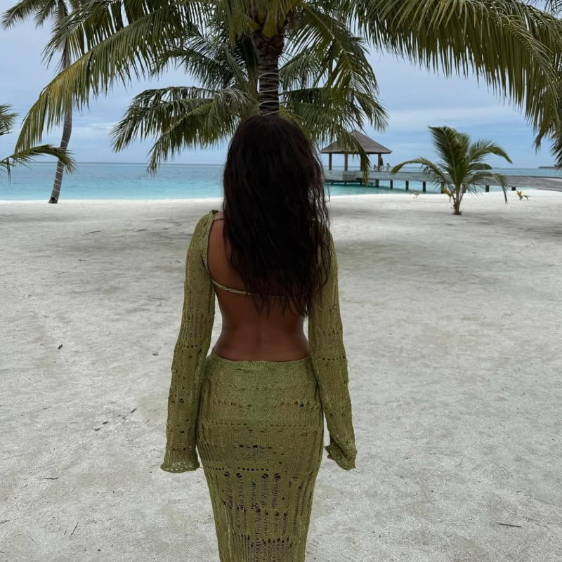 Elegant sheer knit maxi dress with open pattern and shimmer – perfect for trendy beach and holiday looks