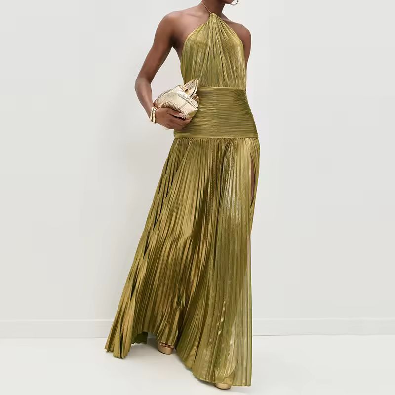 Side view of elegant pleated metallic maxi dress in olive-gold, featuring thigh-high slit and halter neckline, showcasing flowy movement and glamour.