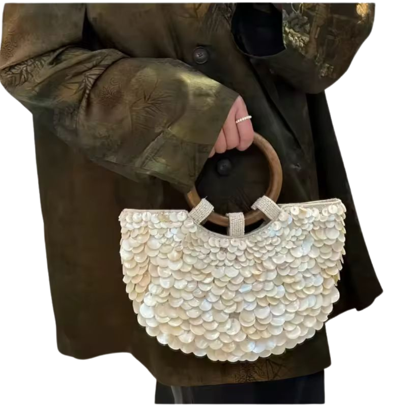 SHELLA handmade straw clutch with wooden handle and shimmering shell disc design – 36x28cm