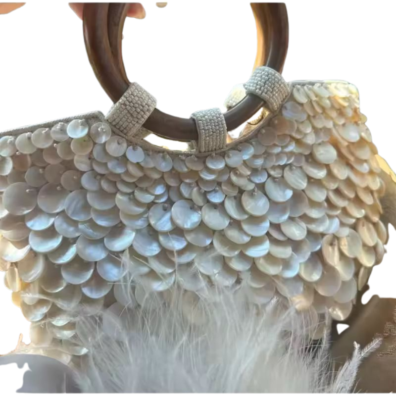 SHELLA handmade straw clutch with wooden handle and shimmering shell disc design – 36x28cm