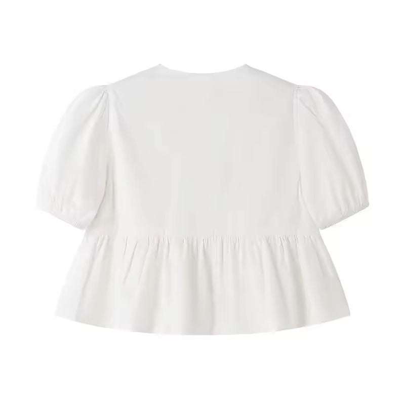 Lightweight white puff sleeve tie-front blouse with round neckline and relaxed fit, perfect for summer outfits.