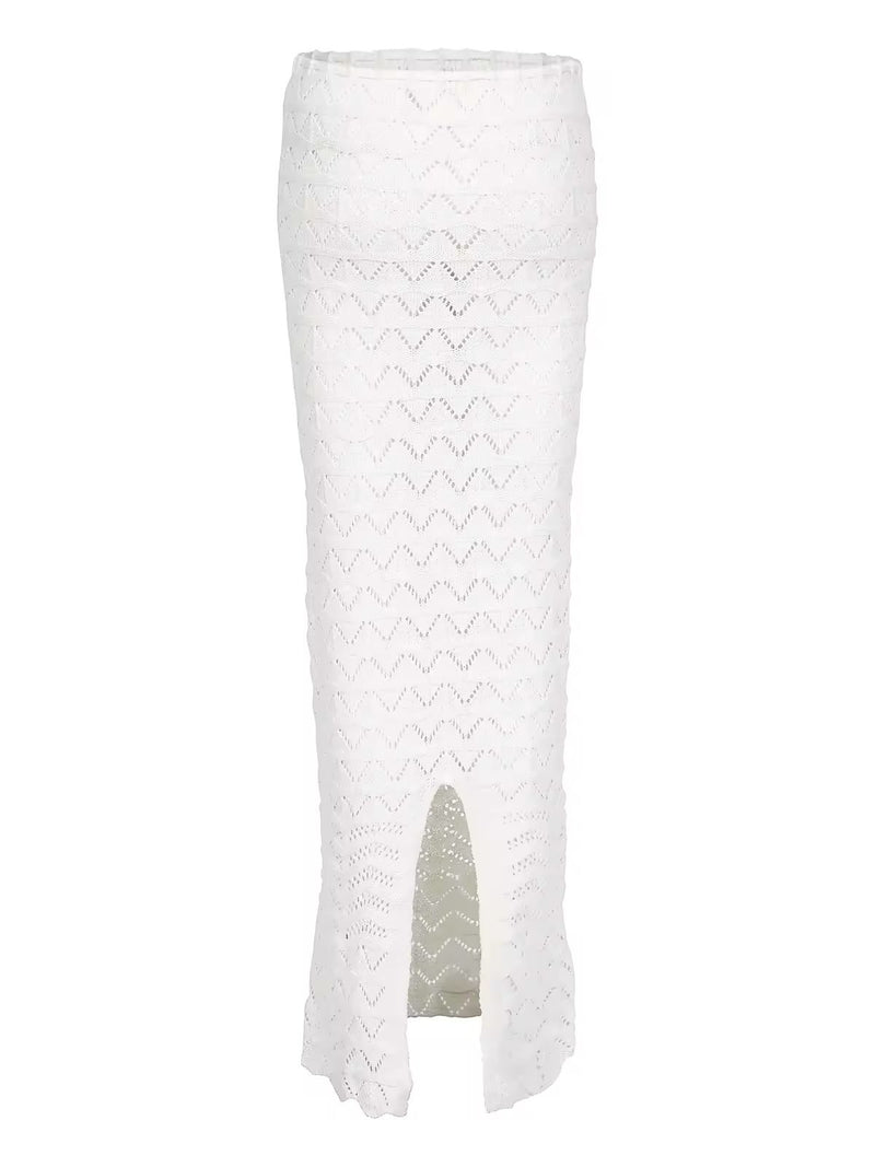 Two-piece Sahara Boho crochet outfit for women in white and brown, featuring an off-shoulder long sleeve crop top and high-waisted maxi skirt with drawstring, perfect for beachwear, festivals, and summer vacations