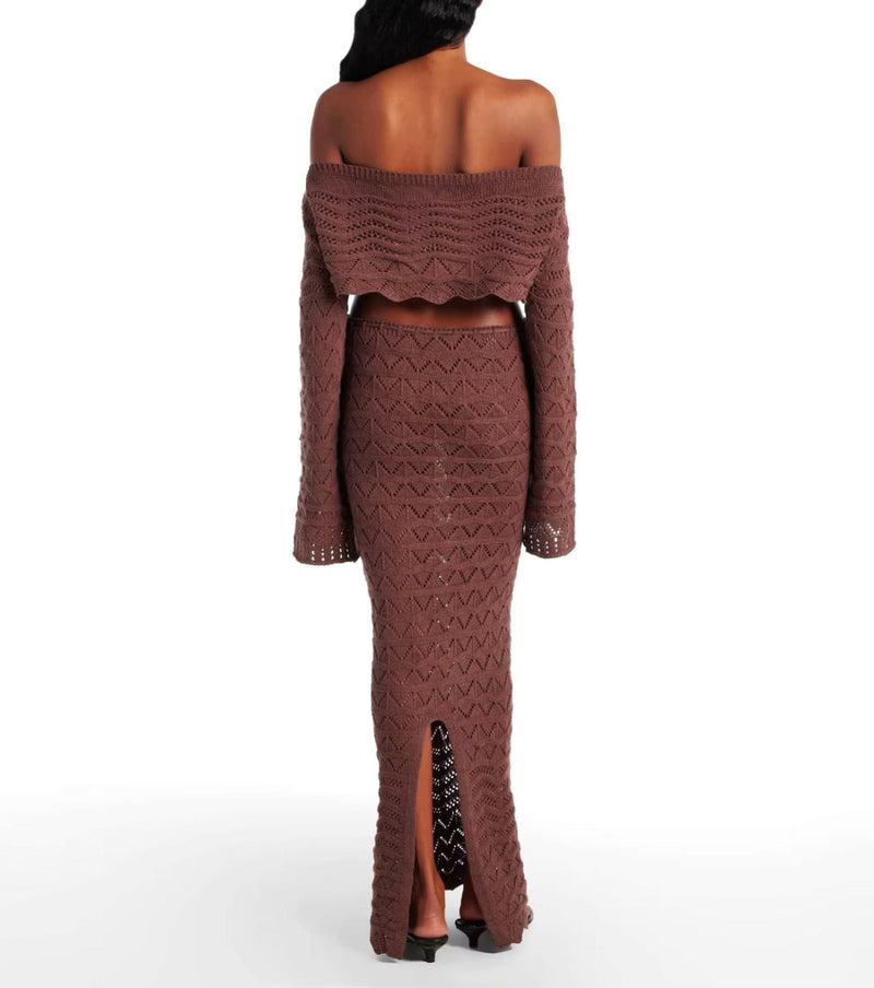 Full styled Sahara Boho look with crochet two-piece set, accessorized with sunglasses, beach hat, and sandals, perfect for a boho-chic summer vibe.