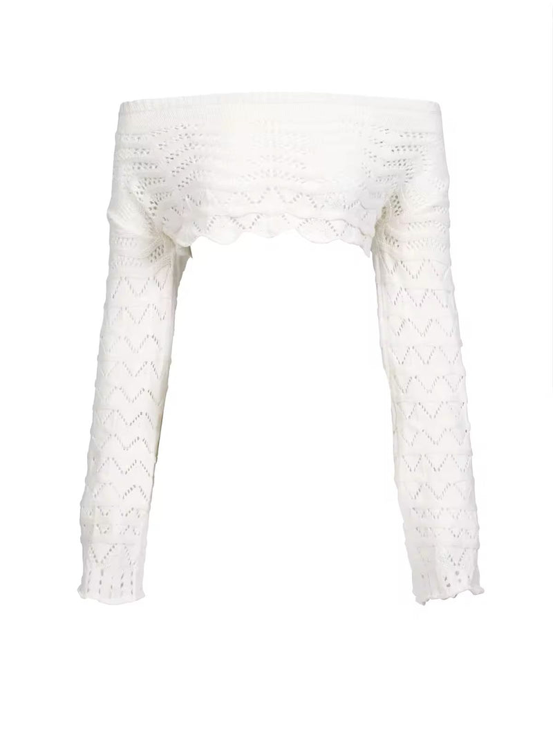 Close-up of crochet off-shoulder long sleeve crop top from Sahara Boho Outfit, featuring detailed knit design and soft, breathable material.